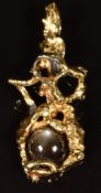 A 1970s 18ct bi-coloured gold pendant set with a quartz star cabochon, London 1973, maker SGC