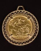 A 1903 gold full sovereign with Melbourne mint mark, in 9ct gold mount, 11.0g
