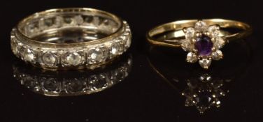 A 9ct gold eternity ring set with spinel and a 9ct gold ring set with an amethyst and cubic