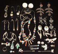 Thirteen pairs of silver earrings, further silver including filigree brooch, four pendants,
