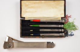 Cased set of four silver bridge or similar pencils, each marked sterling silver, length of case