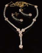 A 14k gold bi-coloured necklace set with cubic zirconia with matching earrings, 9.8g