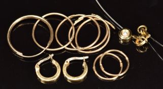 A pair of 18ct gold earrings (1g), two pairs of 9ct gold earrings, three loose 9ct gold earrings (