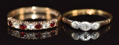 A 9ct gold ring set with garnets and spinel and an 18ct gold ring set with diamonds in a platinum