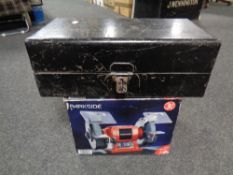 A metal storage box together with a Parkside bench grinder in box