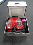 A Rug Doctor steam cleaner in an aluminium crate