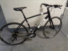 A Merida Crossway Urban 100 hybrid bike