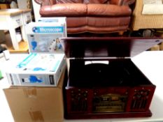 A retro style music centre together with thirteen boxed educational microscopes