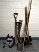 A set of aluminium 3 in 1 ladders together with a bundle of garden tools and a mitre saw