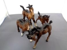 Four Beswick figures,