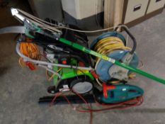A Florabest electric garden airator, together with a Bosch electric hedge trimmer,