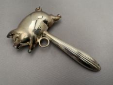 A child's pig rattle