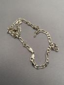 A silver figaro chain CONDITION REPORT: 14g