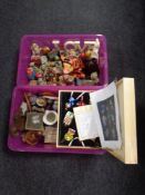 Two plastic storage boxes with lids containing assorted ornaments to include Winnie The Pooh