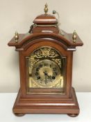 A German Junghans bracket clock with brass dial