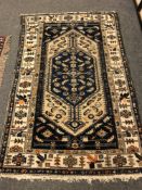 An antique Malayer rug 193 cm x 122 cm