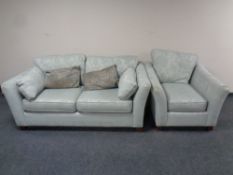 A Marks and Spencer's two seater settee and armchair upholstered in a turquoise floral fabric