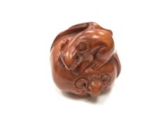 A Chinese hardwood netsuke - A Rat on a Pumpkin.