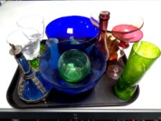 A tray containing 20th century and later coloured glassware to include two tone goblets,