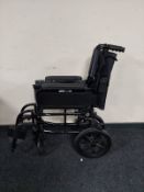 A folding wheelchair