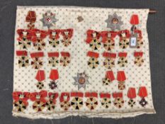 Approximately thirty-five reproduction medals and badges of Russian/ Eastern European interest (35)