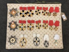 Approximately nineteen reproduction medals and badges of Russian/ Eastern European interest (19)
