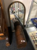 A Singer sewing machine in case together with a gilt framed mirror