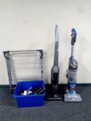 A Vax Air Cordless Solo vacuum together with a Bosch Athiet cordless vacuum, chargers,