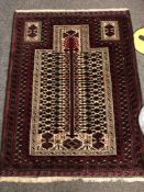 An Afghan prayer rug 131 x 100 cm