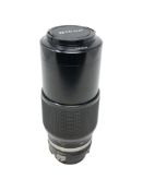 A Nikon lens : Zoom-Nikkor 80~200mm 1:45, numbered 231804, with end caps.