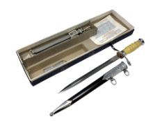 An East German (DDR) Army Officers dagger with blue steel scabbard and plated mounts,