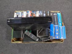 A Sony Blu Ray player with remote and surround speakers,