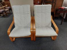 A pair of Ikea armchairs