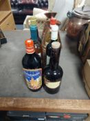 A bag of six various bottles of wine