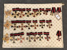 Approximately twenty four reproduction medals and badges of Russian/ Eastern European interest (24)