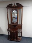 A reproduction hall stand with mirror back