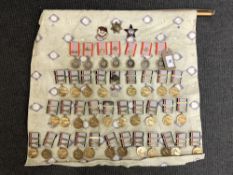 Approximately forty-one reproduction medals and badges of Russian/ Eastern European interest (41)