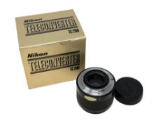 A Nikon TC-200 Teleconverter, boxed.