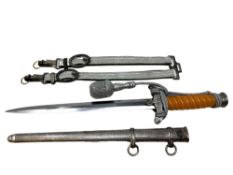 A German Third Reich Army Officer's Dagger by Eickhorn, wrythen orange plastic grip,