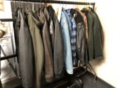 Approximately fourteen gent's jackets and coats including two brown leather jackets, denim jackets,