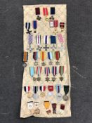 Approximately thirty-three reproduction medals and badges of British interest (33)