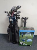 A golf bag containing assorted clubs by Donnay, Cobra, etc,