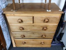 A pine chest of five drawers, 93 cm high x 86.