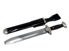 A German Third Reich Enlisted Man's DRK Hewer, the saw back steel blade stamped GES.