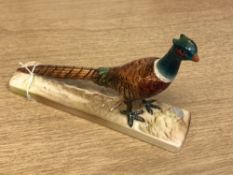 A Beswick china figure : Pheasant - On Pottery Base, model number 1774, gloss,