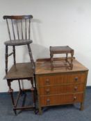 A 20th century walnut three drawer chest together with an ibex kitchen chair,
