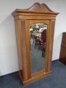 An Edwardian satinwood mirror door wardrobe, height 185 cm,