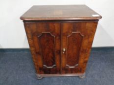 A 19th century mahogany double door cabinet