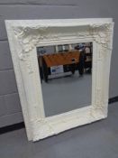 A Victorian style painted framed bevel edged overmantel mirror,