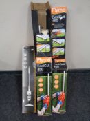 Two boxed Flymo electric hedge cutters together with a Bush cordless stick vacuum (boxed)